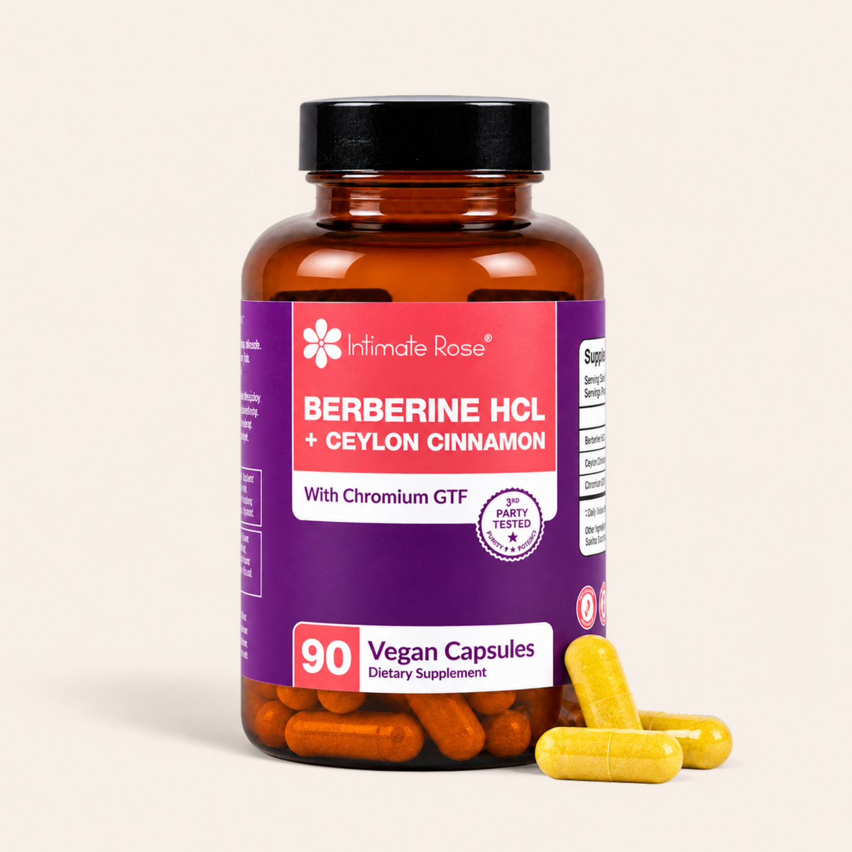 An amber supplement bottle labeled 'Intimate Rose Berberine HCL + Ceylon Cinnamon' with a purple and pink label, shown on a light beige background with several yellow capsules placed in front.