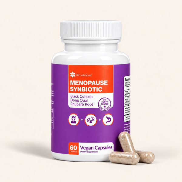 A white plastic bottle of Merida Rose Menopause Synbiotic dietary supplement with a purple and orange label, shown with three beige capsules in the foreground on a light beige background.